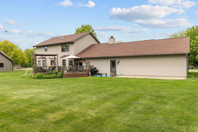 3226 W Twin Willow Ct, Appleton, WI 54914 - back of property featuring a chimney, a yard, and a deck