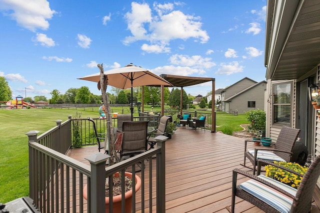 3226 W Twin Willow Ct, Appleton, WI 54914 - wooden terrace with a yard, outdoor dining area, and a playground