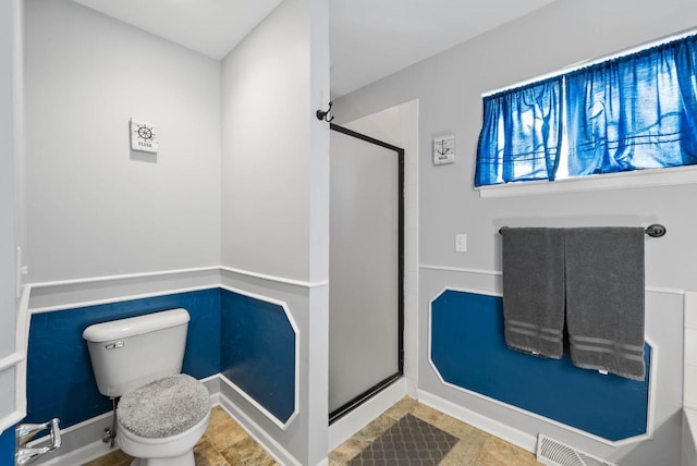 690 Valleyview Ct Unit 35-22, Lake Geneva, WI 53147 - full bathroom with a shower stall, toilet, and baseboards