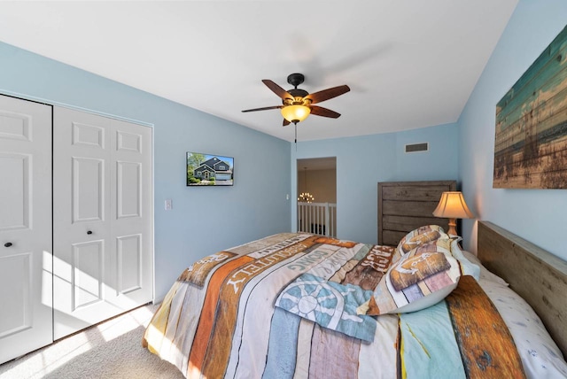 690 Valleyview Ct Unit 35-22, Lake Geneva, WI 53147 - bedroom featuring carpet floors, ceiling fan, a chandelier, and a closet