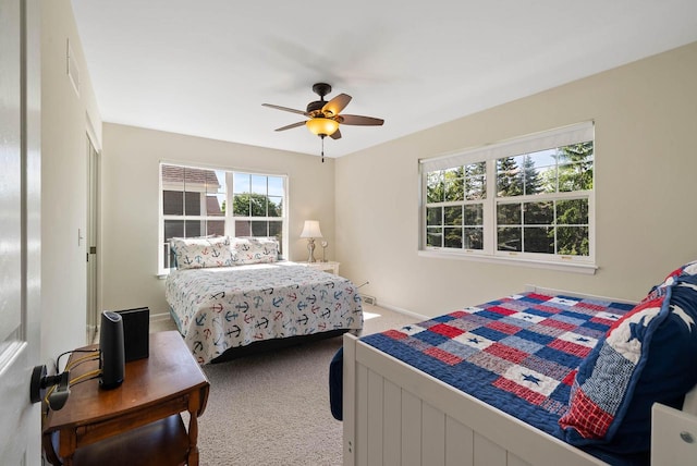 690 Valleyview Ct Unit 35-22, Lake Geneva, WI 53147 - carpeted bedroom featuring ceiling fan and baseboards