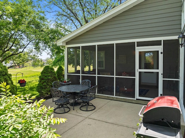 690 Valleyview Ct Unit 35-22, Lake Geneva, WI 53147 - view of patio with a grill and a sunroom