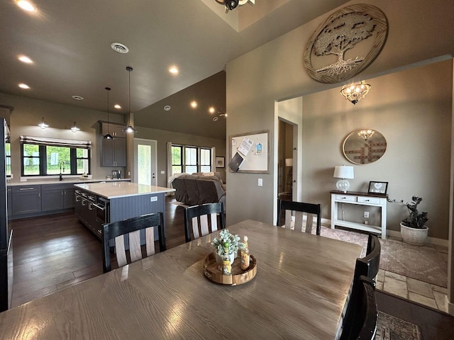 11654 Flambeau Rd, Tomah, WI 54660 - dining space featuring dark wood-type flooring, recessed lighting, and high vaulted ceiling