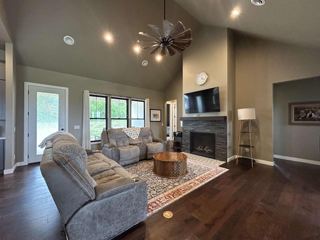 11654 Flambeau Rd, Tomah, WI 54660 - living room with wood finished floors, high vaulted ceiling, a fireplace, baseboards, and recessed lighting