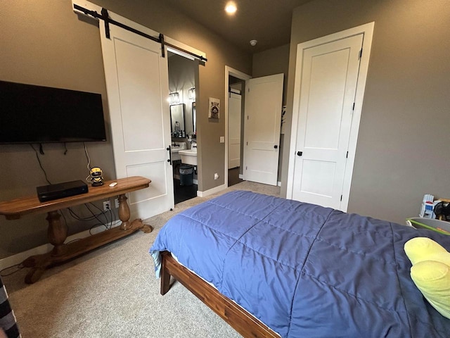 11654 Flambeau Rd, Tomah, WI 54660 - carpeted bedroom featuring a barn door