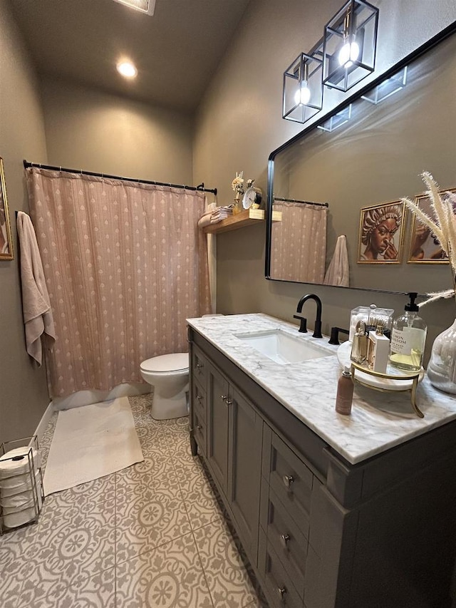 11654 Flambeau Rd, Tomah, WI 54660 - bathroom featuring toilet, vanity, recessed lighting, curtained shower, and tile patterned flooring