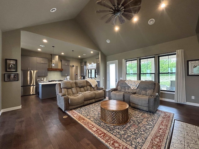 11654 Flambeau Rd, Tomah, WI 54660 - living room featuring baseboards, dark wood-type flooring, high vaulted ceiling, and recessed lighting