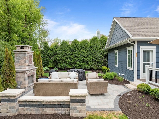 833 Red Hawk Dr, Walworth, WI 53184 - view of patio / terrace with an outdoor living space with a fireplace