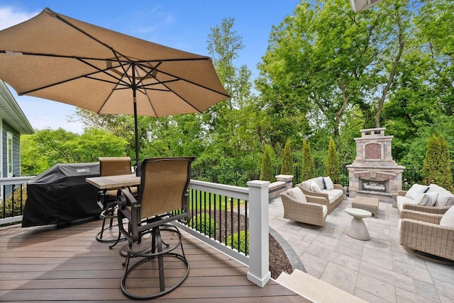 833 Red Hawk Dr, Walworth, WI 53184 - wooden deck with an outdoor living space with a fireplace, a grill, a patio, and view of wooded area