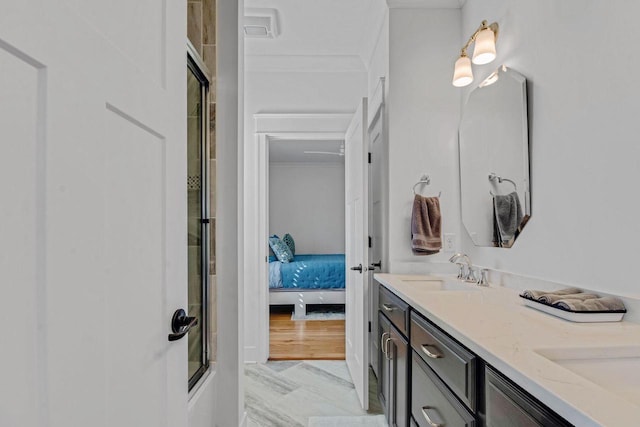 833 Red Hawk Dr, Walworth, WI 53184 - ensuite bathroom featuring double vanity and combined bath / shower with glass door