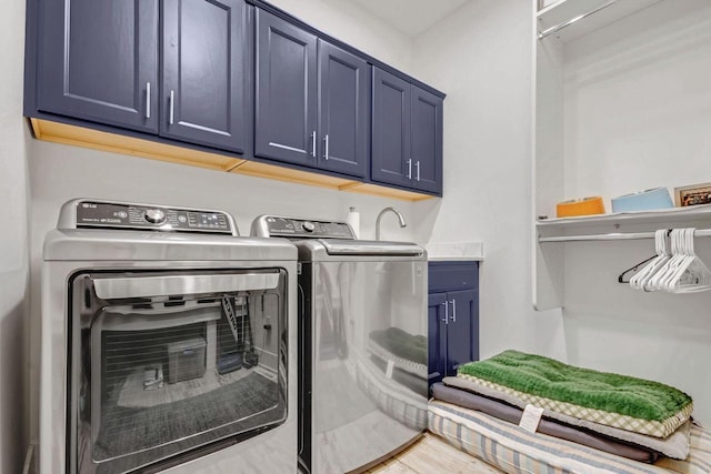 833 Red Hawk Dr, Walworth, WI 53184 - laundry area featuring cabinet space and washing machine and clothes dryer