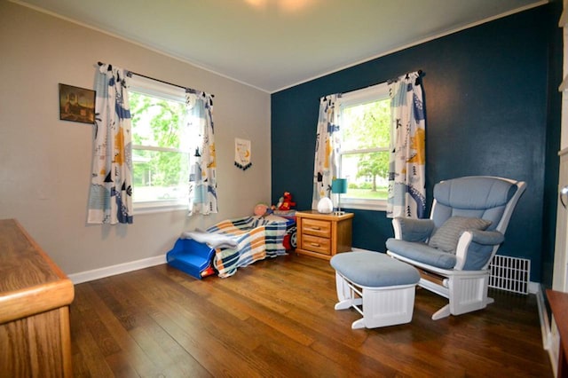 10432 W Manor Park Dr, West Allis, WI 53227 - bedroom with hardwood / wood-style flooring, multiple windows, crown molding, and baseboards