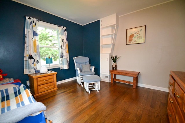 10432 W Manor Park Dr, West Allis, WI 53227 - sitting room with dark wood-type flooring, baseboards, and crown molding