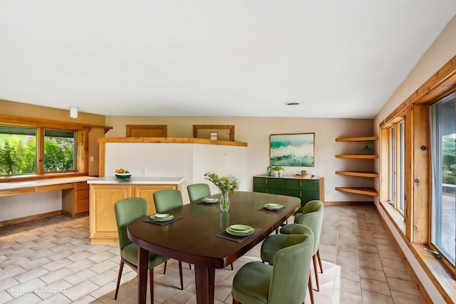 1510 County Road Qq, Mineral Point, WI 53565 - dining space with light tile patterned floors and baseboards