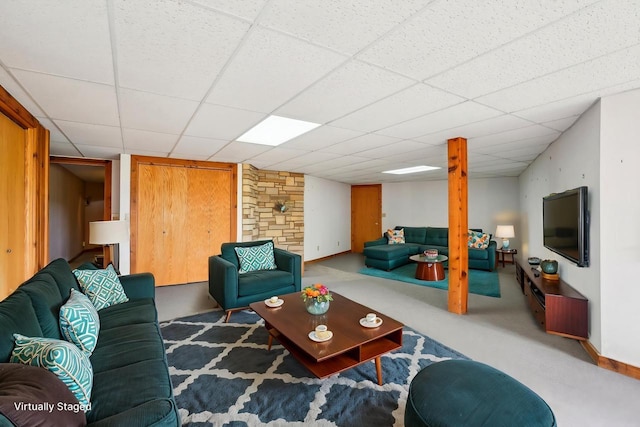 1510 County Road Qq, Mineral Point, WI 53565 - living area with baseboards, carpet flooring, and a paneled ceiling