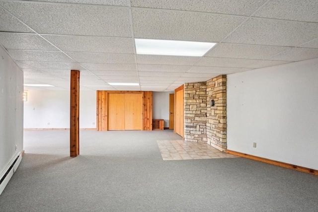 1510 County Road Qq, Mineral Point, WI 53565 - finished basement featuring a baseboard radiator, carpet, a drop ceiling, and baseboards