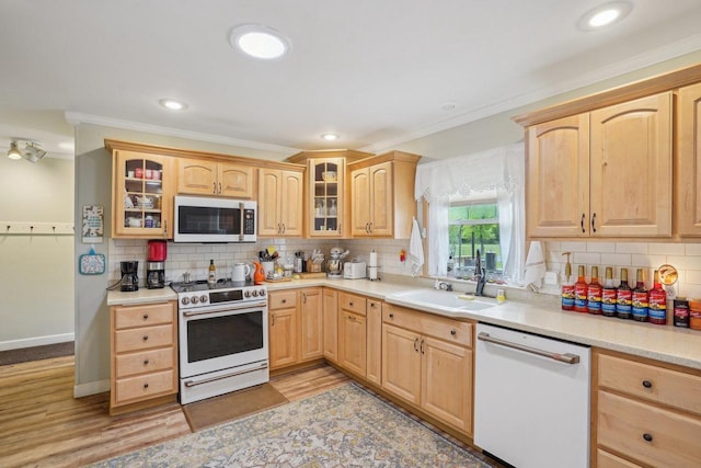 354 Pine Ct, Muscoda, WI 53573 - kitchen featuring white appliances, light brown cabinets, a sink, ornamental molding, and recessed lighting