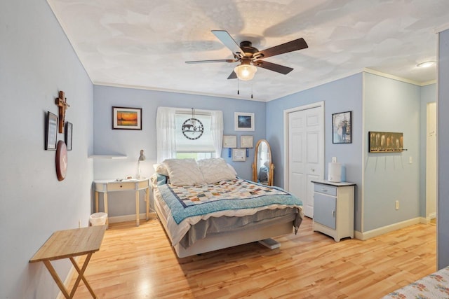354 Pine Ct, Muscoda, WI 53573 - bedroom featuring light wood finished floors, baseboards, crown molding, and ceiling fan