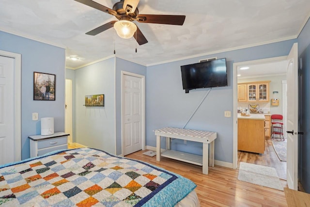 354 Pine Ct, Muscoda, WI 53573 - bedroom with light wood-style flooring, baseboards, ornamental molding, and ceiling fan