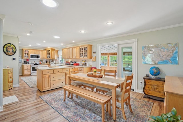 354 Pine Ct, Muscoda, WI 53573 - dining area with crown molding, light wood-type flooring, and recessed lighting