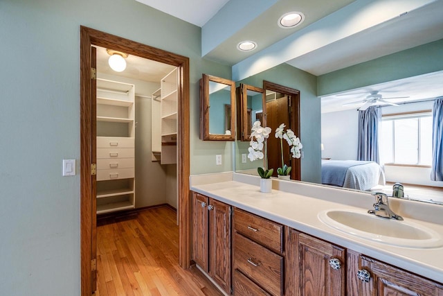 7423 Cedar Creek Trl, Madison, WI 53717 - ensuite bathroom featuring vanity and wood finished floors