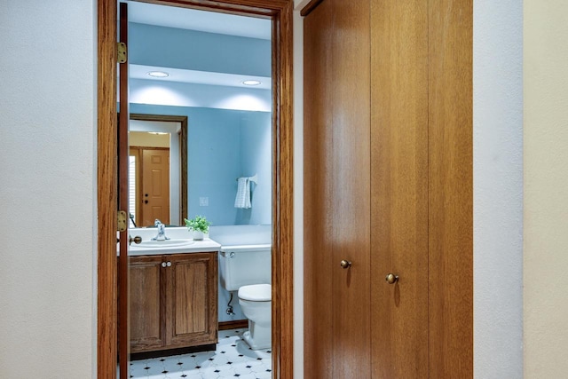 7423 Cedar Creek Trl, Madison, WI 53717 - bathroom with vanity, toilet, and tile patterned floors
