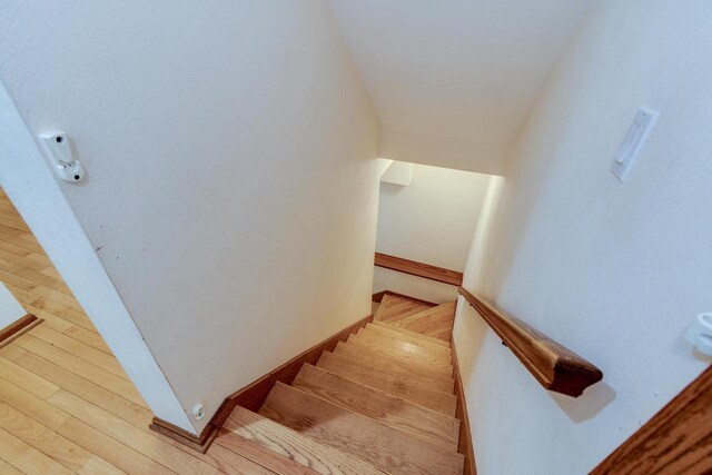 7423 Cedar Creek Trl, Madison, WI 53717 - stairway with wood finished floors