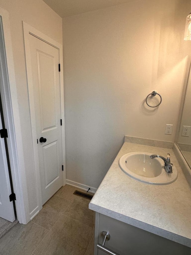 959 Sully Way, Sheboygan Falls, WI 53085 - bathroom with vanity and baseboards