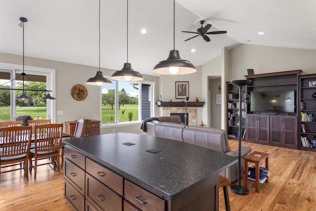 W4949 Cottage Ln, Sherwood, WI 54169 - kitchen with dark countertops, a ceiling fan, healthy amount of natural light, vaulted ceiling, and recessed lighting