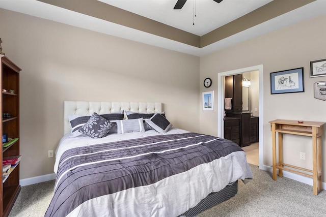 W4949 Cottage Ln, Sherwood, WI 54169 - carpeted bedroom featuring connected bathroom, baseboards, and ceiling fan