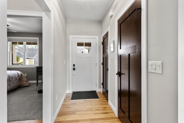 W4949 Cottage Ln, Sherwood, WI 54169 - entryway with light wood-style flooring and baseboards