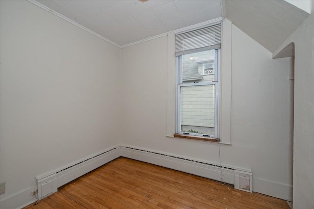 1112 Baxter Ave, Superior, WI 54880 - bonus room with light wood-type flooring and a baseboard heating unit