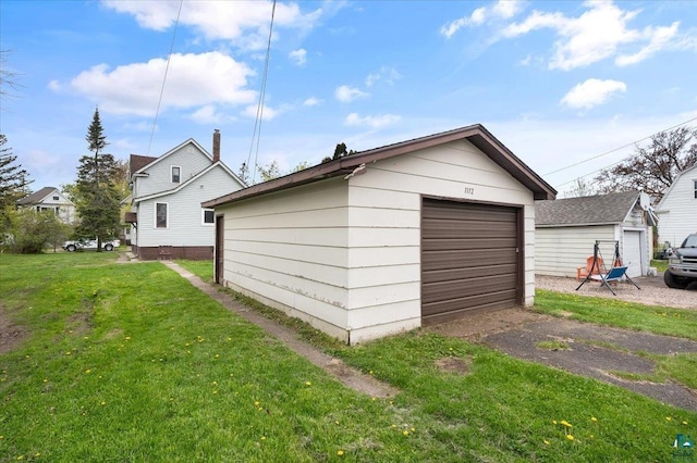 1112 Baxter Ave, Superior, WI 54880 - detached garage with asphalt driveway
