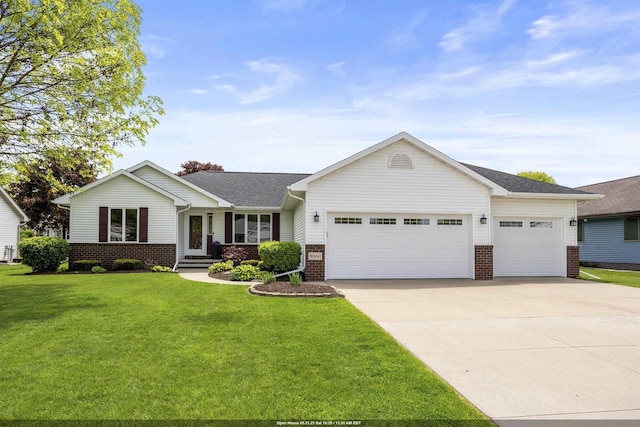 W5841 Easter Lily Dr, Appleton, WI 54915 - single story home featuring a garage, brick siding, and concrete driveway