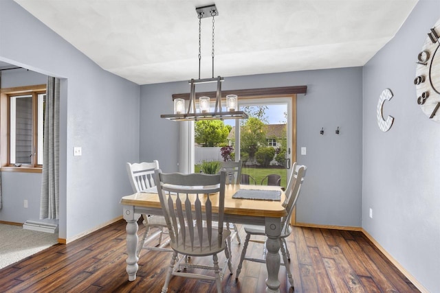 W5841 Easter Lily Dr, Appleton, WI 54915 - dining room with wood finished floors, baseboards, and a chandelier