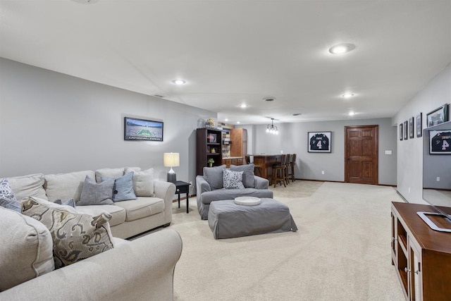 W5841 Easter Lily Dr, Appleton, WI 54915 - living area with light carpet, baseboards, recessed lighting, and bar area