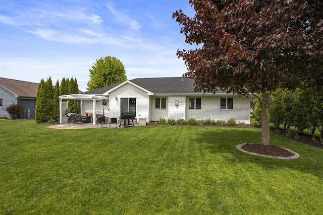W5841 Easter Lily Dr, Appleton, WI 54915 - back of property featuring a yard, a patio, and roof with shingles