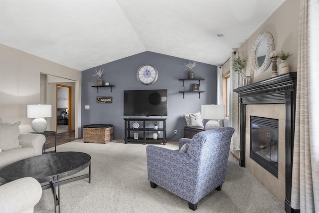 W5841 Easter Lily Dr, Appleton, WI 54915 - carpeted living area featuring a tiled fireplace and lofted ceiling