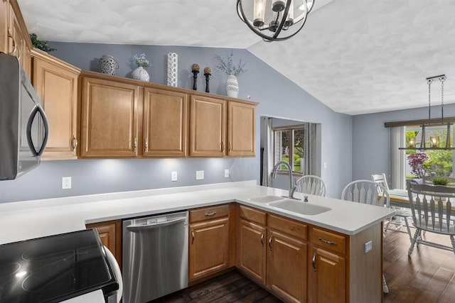 W5841 Easter Lily Dr, Appleton, WI 54915 - kitchen with stainless steel dishwasher, a sink, a chandelier, electric range, and lofted ceiling