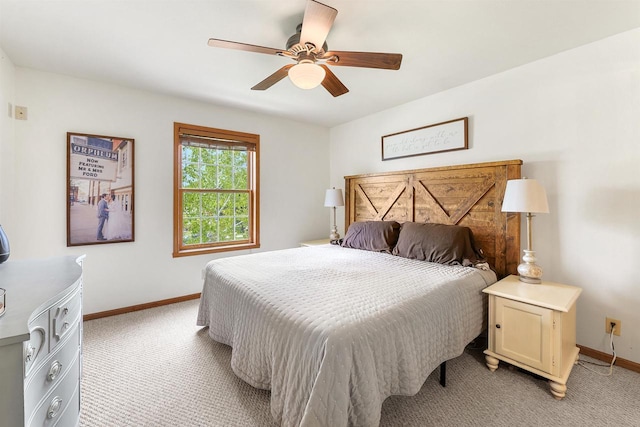 665 N Prairie Rd, Fond Du Lac, WI 54935 - bedroom featuring light carpet, baseboards, and ceiling fan