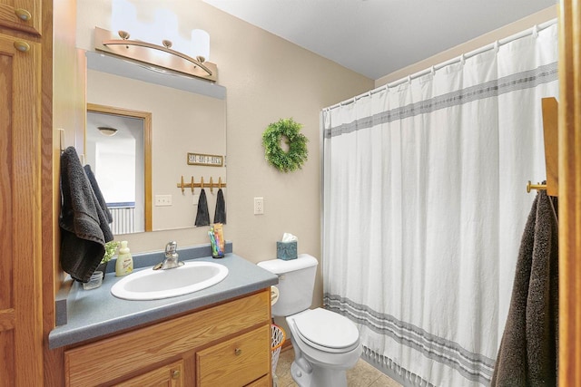 665 N Prairie Rd, Fond Du Lac, WI 54935 - full bathroom with toilet, vanity, tile patterned floors, and a shower with curtain