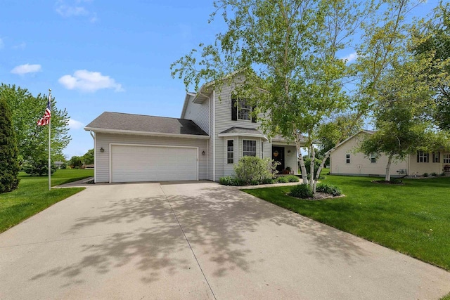 665 N Prairie Rd, Fond Du Lac, WI 54935 - traditional-style home with driveway, a front lawn, and a garage