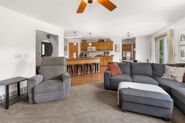 665 N Prairie Rd, Fond Du Lac, WI 54935 - living room featuring light colored carpet and ceiling fan