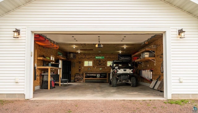 1223 Macarthur Ave, Ashland, WI 54806 - garage featuring wooden walls