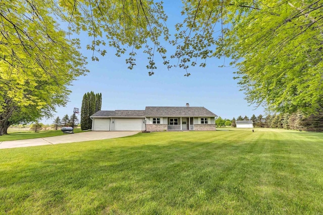 3687 Foxwoods Ln, Abrams, WI 54101 - view of front of home with a garage, a front yard, driveway, and a chimney