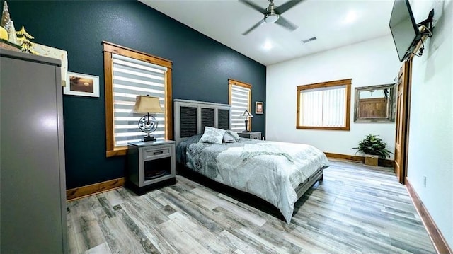 N528 Park Dr, New Auburn, WI 54757 - bedroom featuring wood finished floors, baseboards, and ceiling fan