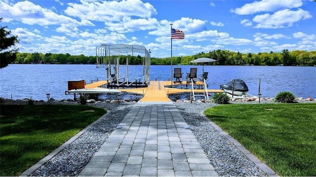 N528 Park Dr, New Auburn, WI 54757 - dock with boat lift, a water view, and a lawn