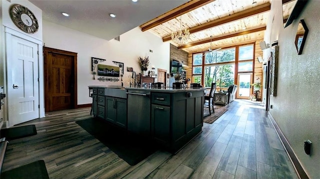 N528 Park Dr, New Auburn, WI 54757 - kitchen with wooden ceiling with exposed beams, baseboards, dark wood-style floors, a kitchen island, and high vaulted ceiling
