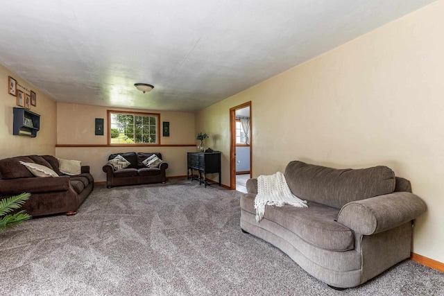 1320 Raymond Ct, Platteville, WI 53818 - carpeted living area with baseboards