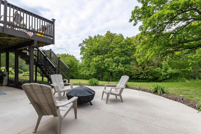 1320 Raymond Ct, Platteville, WI 53818 - view of patio / terrace with stairs, a fire pit, and a wooden deck